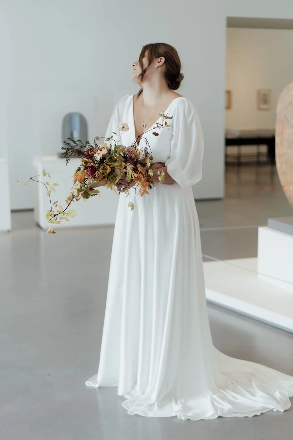 The Obsession Dress. Understated simple wedding dress with sleeves